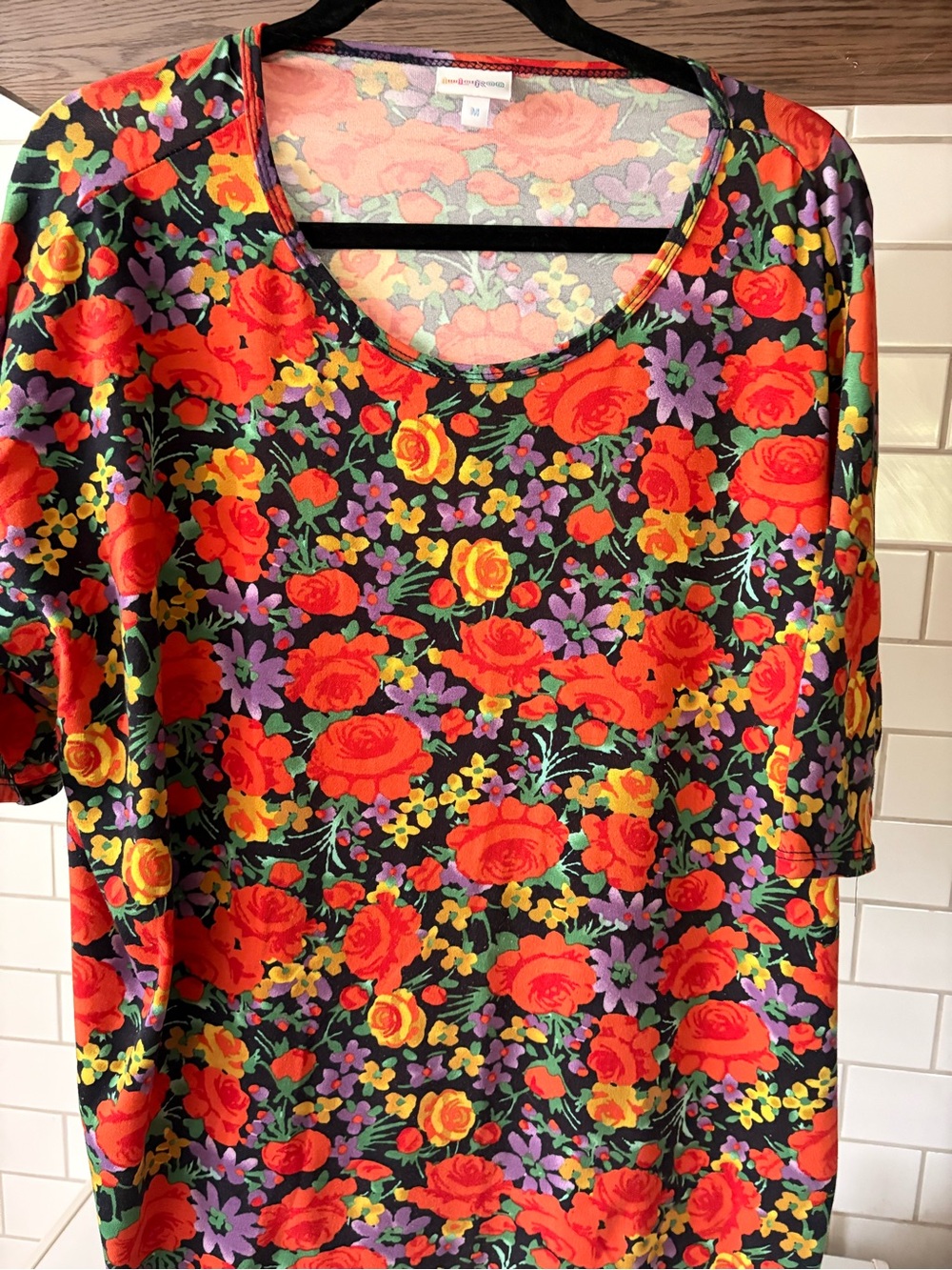 LuLaRoe Black Floral Short Sleeve Tee with Red, Yellow & Purple Roses